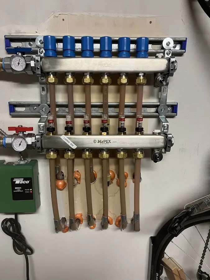 Plumber performing Gas Line Installation at a residential property in Forest City